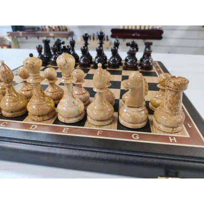 Шахматы подарочные из карельской березы на доске из черного дерева 45 на 45 см