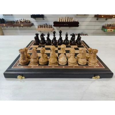 Шахматы подарочные из карельской березы на доске из черного дерева 45 на 45 см