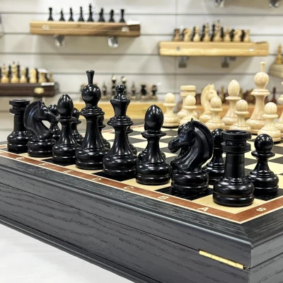 Шахматы подарочные в ларце из моренного дуба