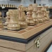 Шахматы подарочные в ларце из дуба с фигурами из карельской березы
