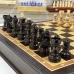 Шахматы подарочные в ларце из дерева венге с фигурами из карельской березы