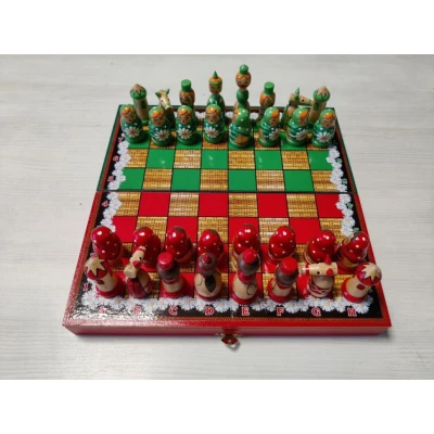 Шахматы сувенирные Матрешки красно-зеленые