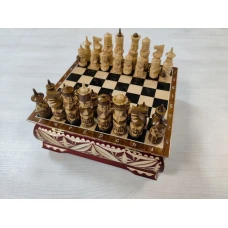 Шахматы резные ручной работы Богатыри в ларце 25 на 25 см