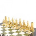 Шахматы подарочные из бронзы Спартанцы доска из камня 40х40 см